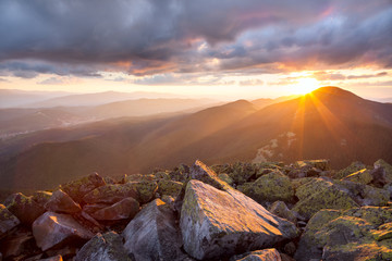 Wall Mural - Majestic sunset in the mountains landscape. Dramatic sky and col