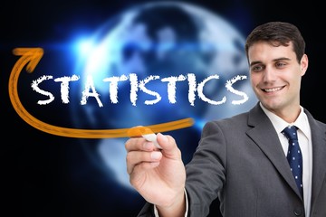 Poster - Businessman writing the word statistics