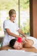 © WavebreakmediaMicro - Brunette enjoying a peaceful massage