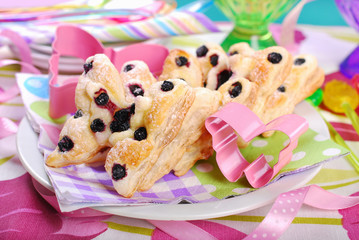 Wall Mural - butterfly shaped puff pastry cookies with blueberry