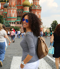 Wall Mural - Beautiful woman in red square, Moscow, Russia