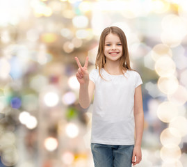 Poster - little girl in white t-shirt showing peace gesture