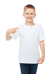 smiling little boy in blank white t-shirt