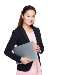 Wall Mural - Asian business woman hold with laptop computer