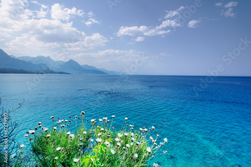 Beautiful seascape with sea, clouds and mountains Poster