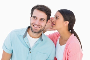 Poster - Brunette whispering secret to her boyfriend