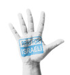Open hand raised, Pray for Israeli sign painted