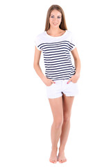 Poster - Beautiful young girl in shorts and t-shirt isolated on white