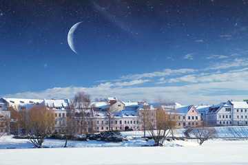 Wall Mural - city ​​winter night. Elements of this image furnished by NAS