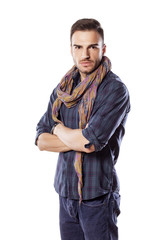 Wall Mural - handsome young man with a scarf and crossed arms