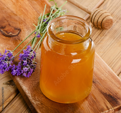 Naklejka na kafelki Glass jar of honey