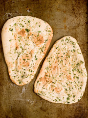 Canvas Print - rustic indian garlic and parsley naan bread