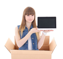 Wall Mural - girl with laptop in cardboard box isolated on white