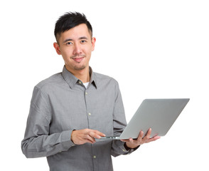 Canvas Print - Asian man type on laptop computer