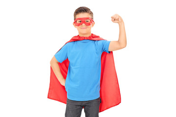 Wall Mural - Junior superhero holding his fist in the air