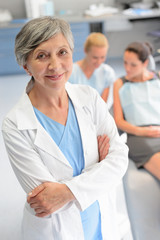 Wall Mural - Professional dentist woman patient at dental surgery