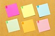 © Jenifoto - Various blank post it notes with tacks on bulletin board