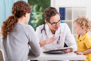 Mother and cute child at doctor's office