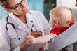 © Photographee.eu - Pediatrician doctor examining little baby