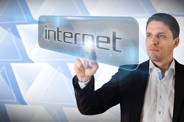 Aufkleber - Businessman pointing to word internet