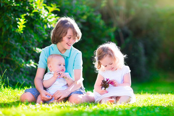 Wall Mural - Happy pretty kids in the garden