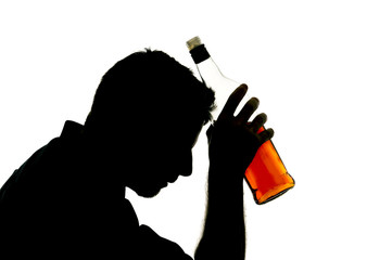 alcoholic man with whiskey bottle addiction problem silhouette