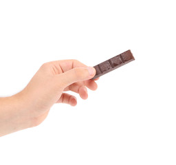 Poster - Hand holding foiled dark chocolate bar.