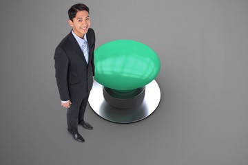 Poster - Composite image of smiling asian businessman