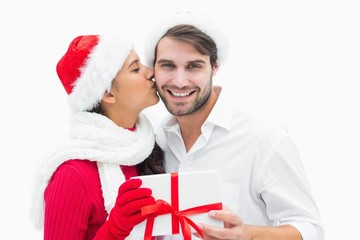 Poster - Attractive festive woman giving boyfriend a kiss and present