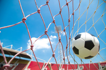 Soccer ball in the goal after shooted