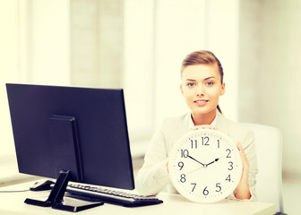 Wall Mural - attractive businesswoman with white clock