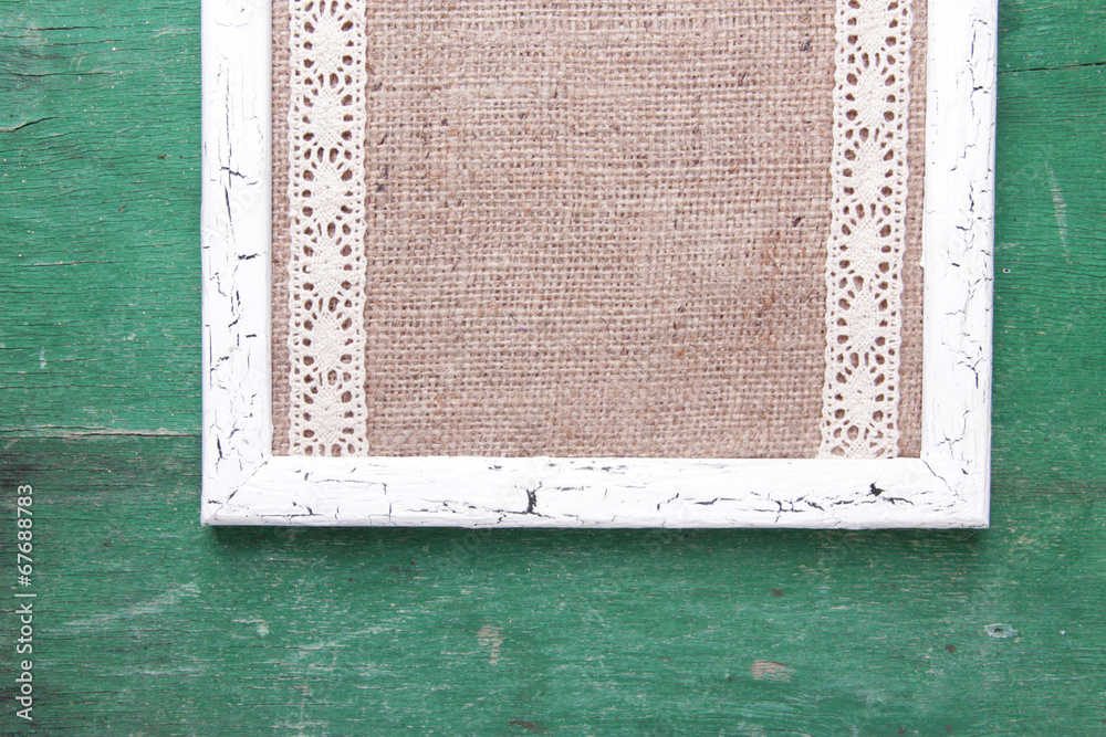 Wooden frame on wooden background