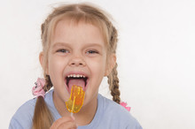 Funny Girl Licking A Lollipop