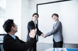 © Nonwarit - Business handshake and business people