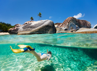 Poster - Woman snorkeling at tropical water