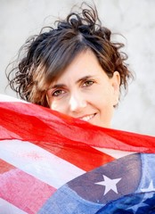 Closeup beautiful young brunette, american flag