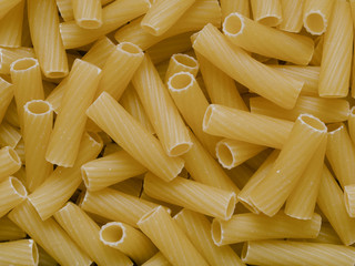 Sticker - uncooked maccheroni pasta tubes food texture background