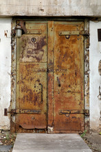 Rusty Old Metal Door In An Abandoned Factory