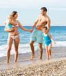 © JackF - Family with two kids on beach