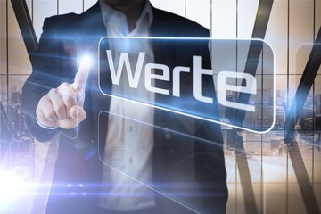 Aufkleber - Businessman presenting the word values in german
