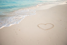 Heart Painted In White Sand On A Tropical Beach