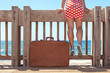 woman with vintage suitcase