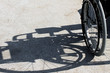 shadow of the wheelchair and the detail of the tyre