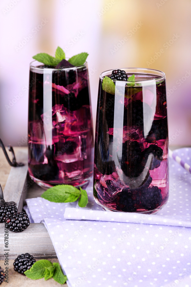 Tasty cool blackberry lemonade with ice