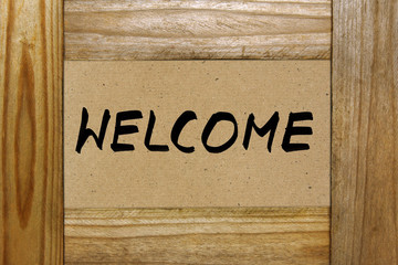 Wall Mural - word welcome in wooden frame