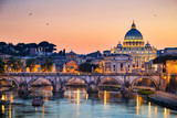 Fototapeta Paryż - Night view of the Basilica St Peter in Rome, Italy
