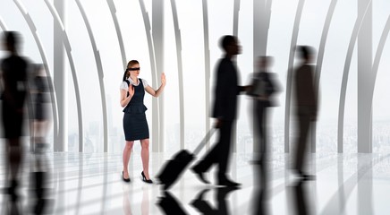 Poster - Composite image of redhead businesswoman in a blindfold