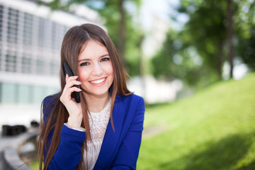 Wall Mural - Businesswoman talking on the phone