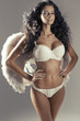 Conceptual photo of attractive woman angel