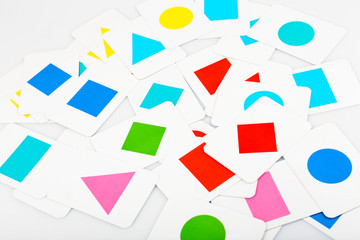 Educational cards with color geometric shapes, close up